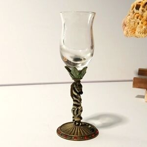 Elegant Glass Goblet with Ornate Stem